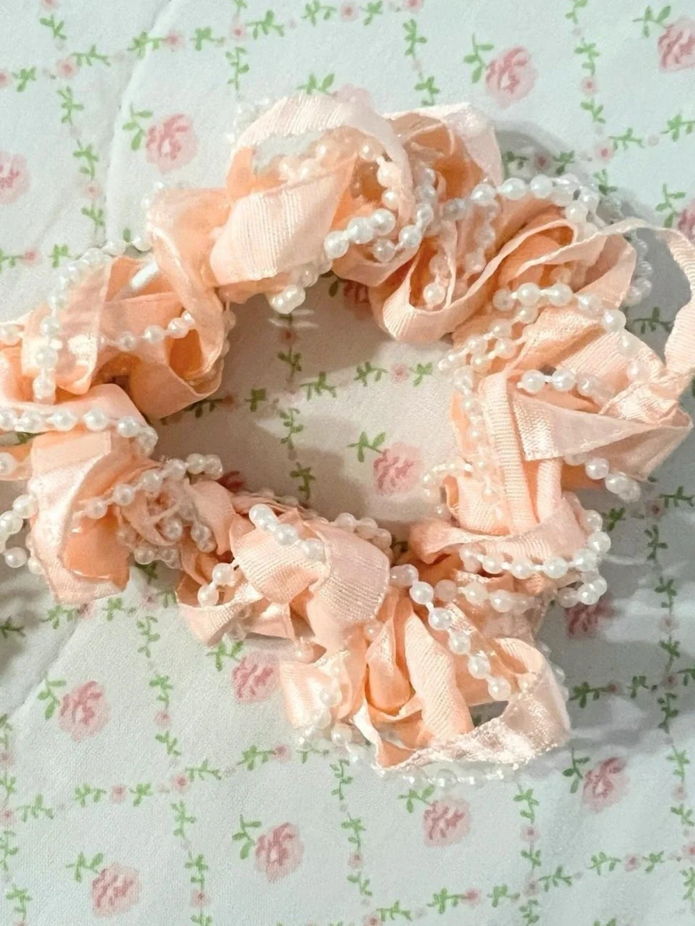 Peach colored scrunchies set.